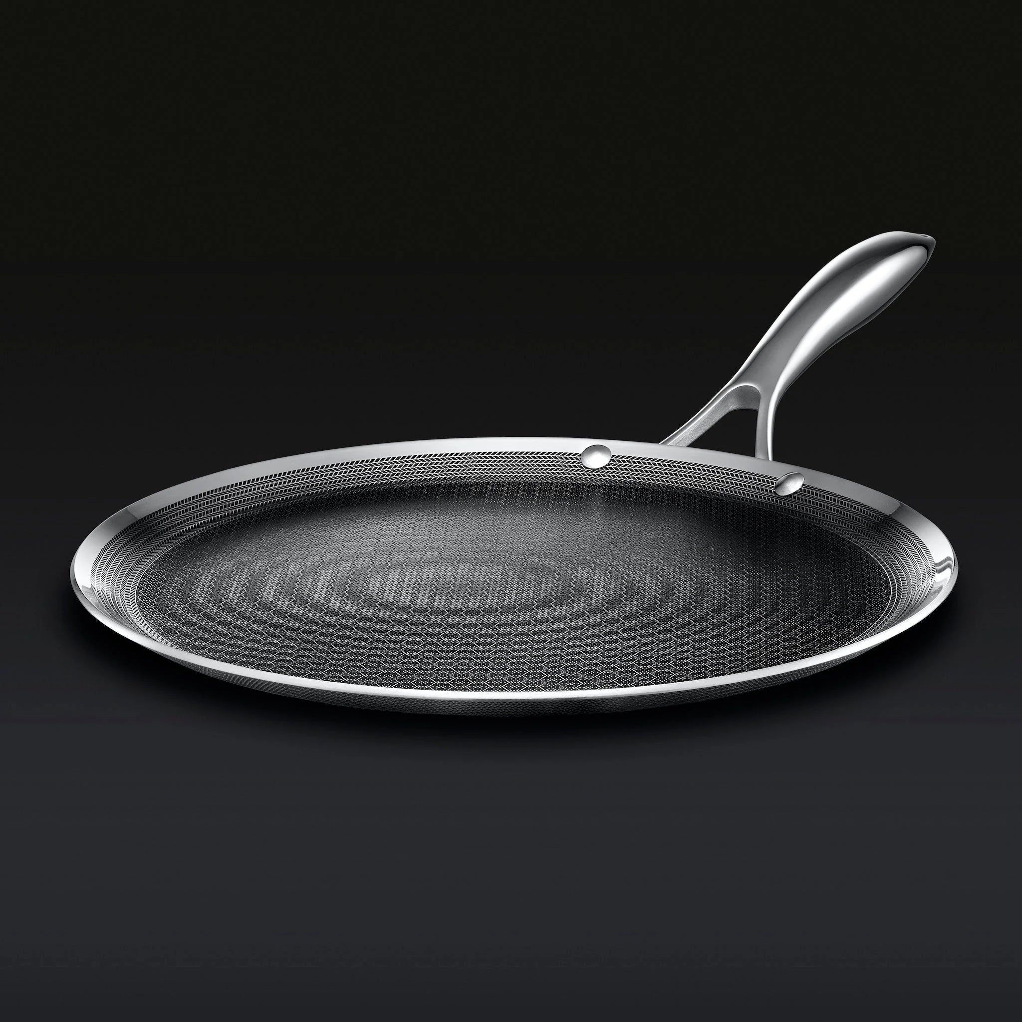 Hexclad Griddle 30cm stekepanne, med synlig sekskantmønster på mørkegrå bunn og blankt stålhåndtak
