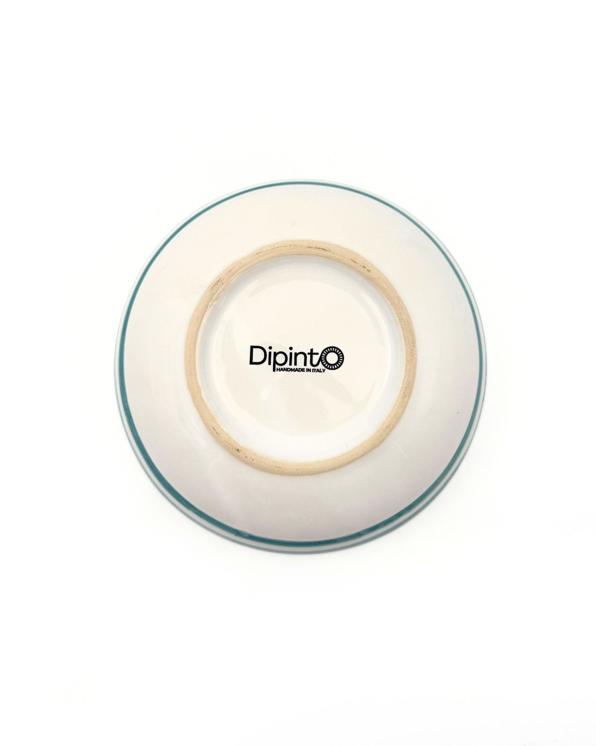 Baksiden av Dipinto Ceramics Amalfi bolle medium i hvit keramikk med blå/grønn kant, og "Dipinto handmade in Italy"-stempel