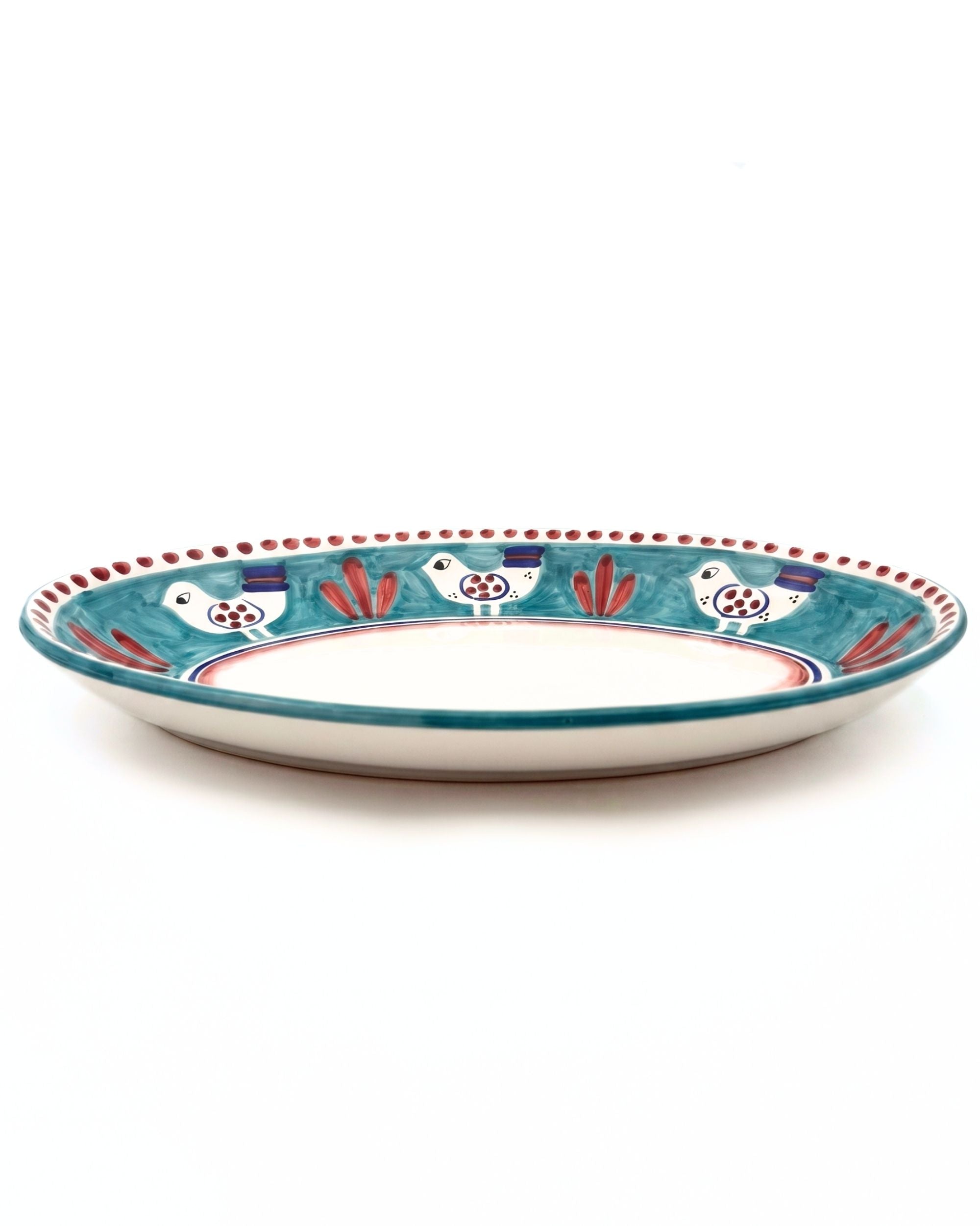 Dipinto Ceramics Amalfi Ovalt Fat med håndmalt mønster av fugler, prikker og blader i turkis og rød keramikk