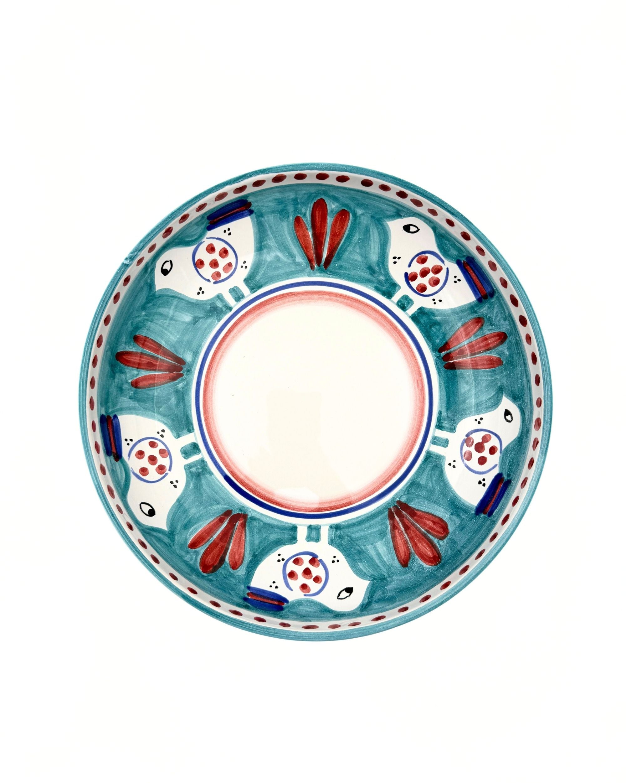 Dipinto Ceramics Amalfi pastabolle, detaljbilde med håndmalt mønster av fugler i rødt, hvitt og blått på turkis bakgrunn