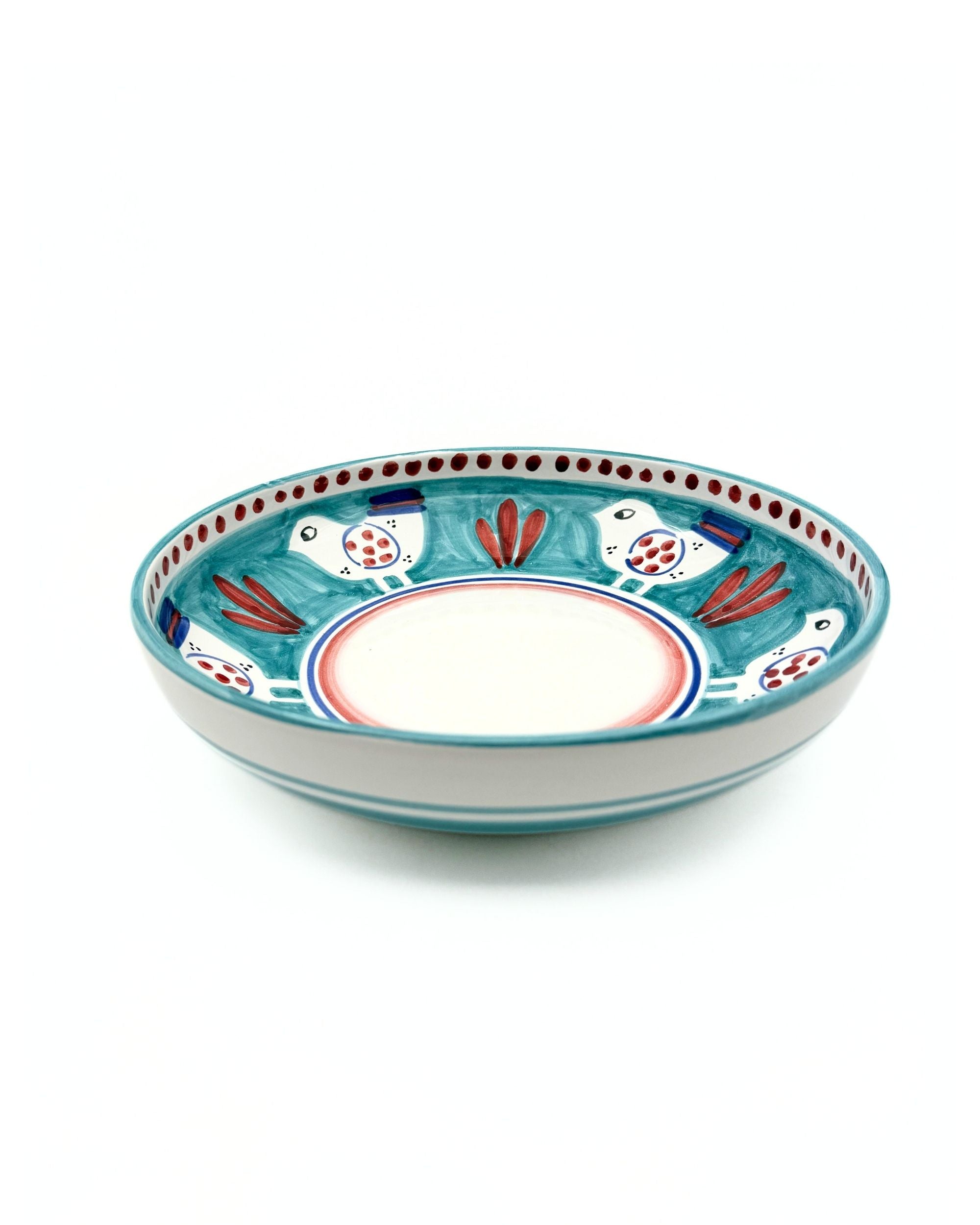 Dipinto Ceramics Amalfi Pastabolle i beige keramikk med turkis, rød og blåmønstret dekor av fugler og striper