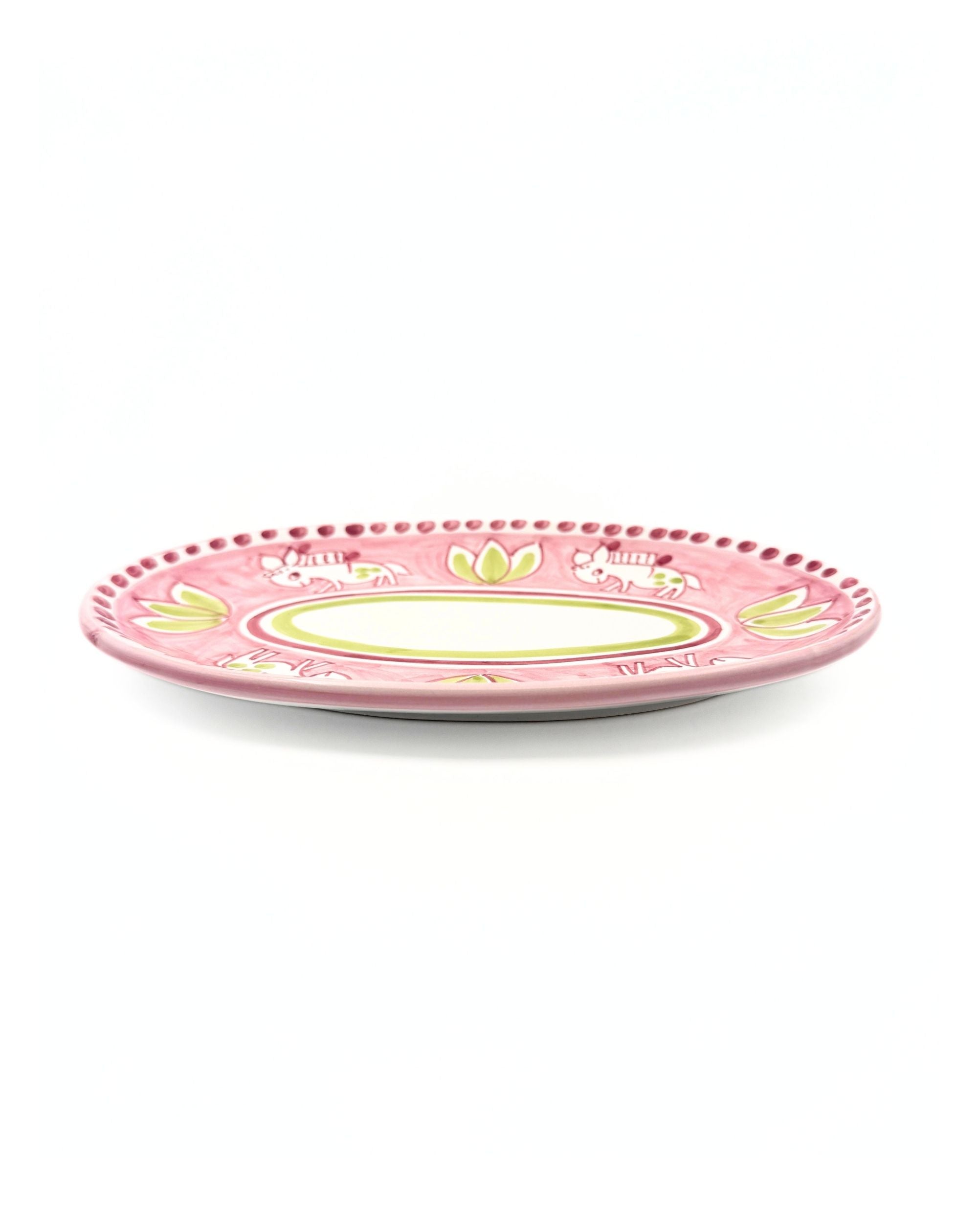 Amalfi Ovalt Fat 24cm, Dipinto Ceramics. Rosa keramikkfat med grønne og hvite detaljer, små elefanter.