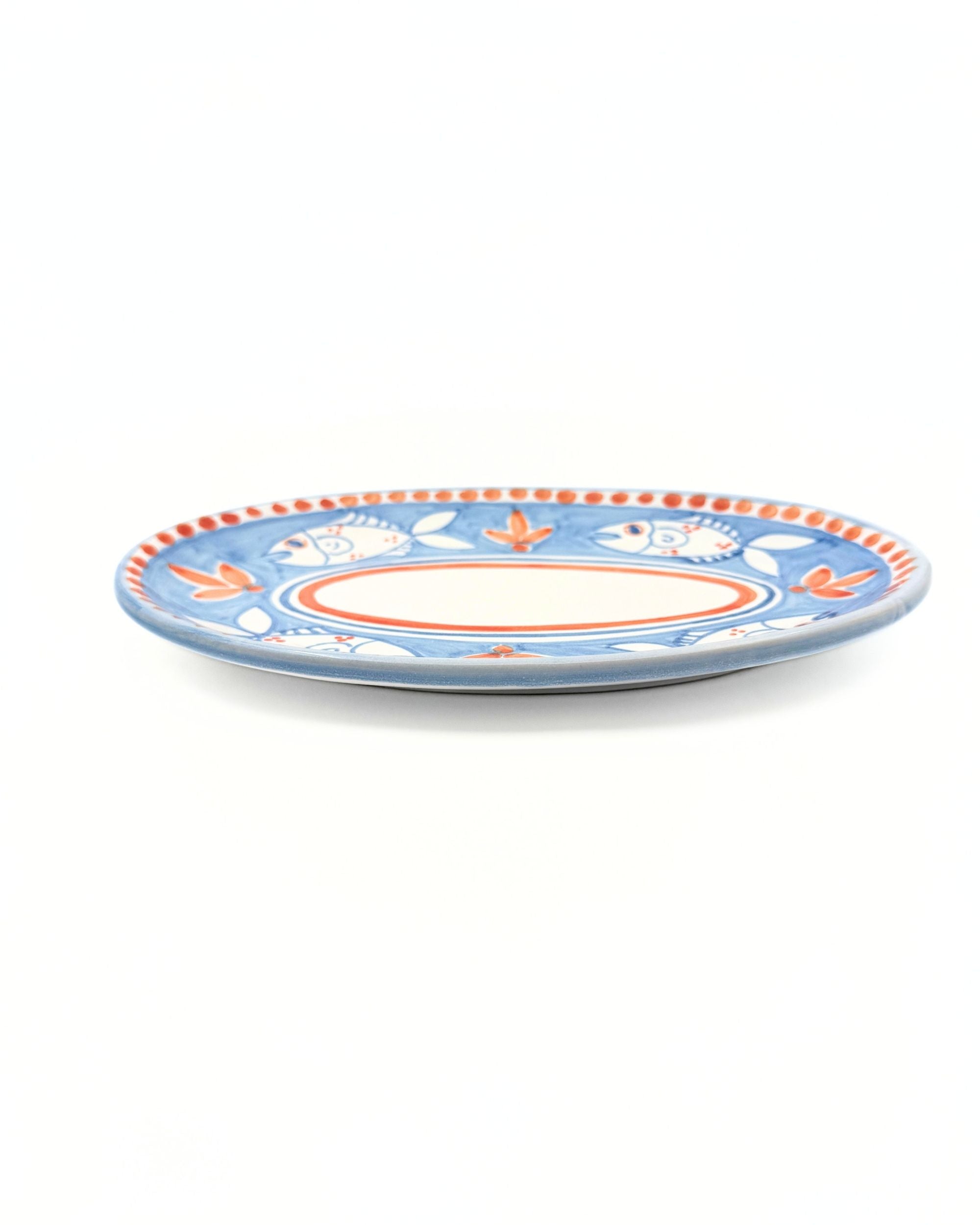 Dipinto Ceramics Amalfi ovalt fat 24cm med håndmalt blå kant, fiskemotiv og oransje detaljer i keramikk
