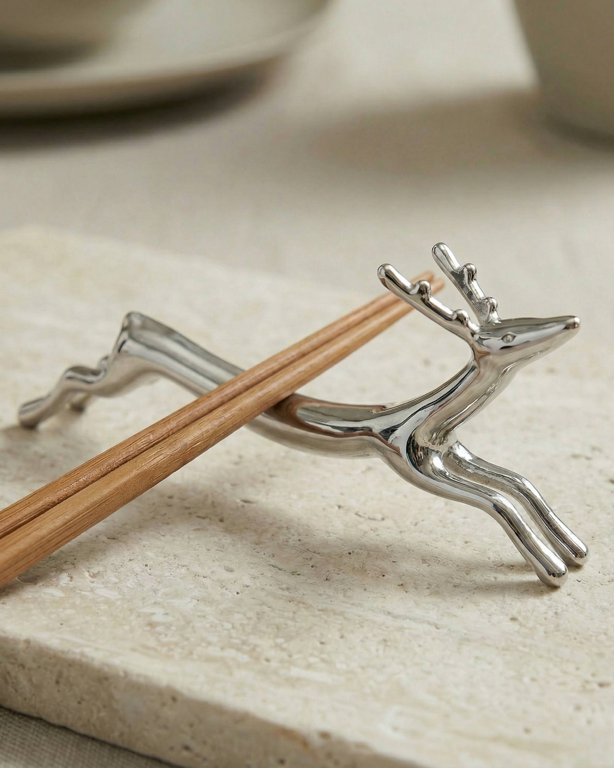 RÅDYR Sett a 4 bestikkhvilere i rustfritt stål